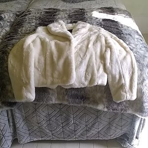 Luxurious off white faux fur coat